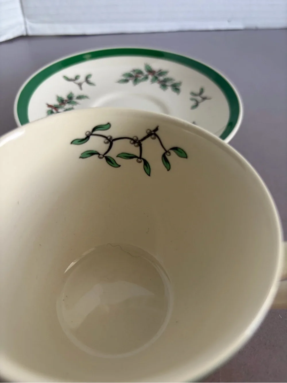 Spode Cream Teacup and Saucer with Green Holly and Red Berry Motif